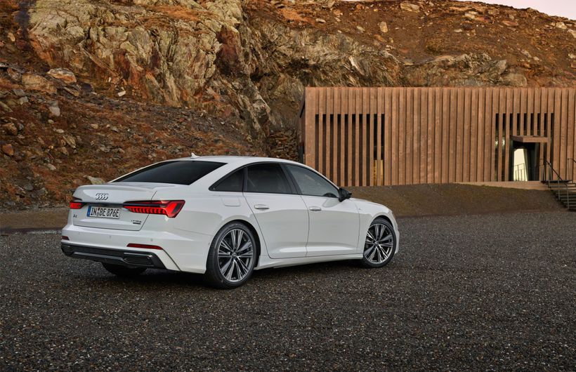 White Audi A6 parked rear and right side