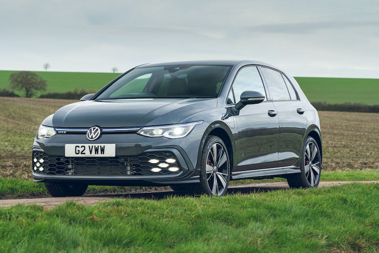 VW Golf GTE PHEV exterior front in countryside