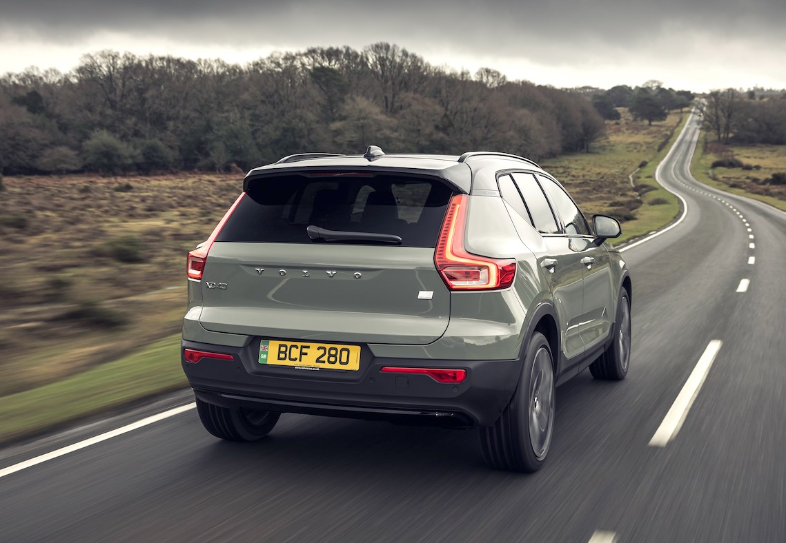 Volvo XC40 Recharge rear action shot in countryside