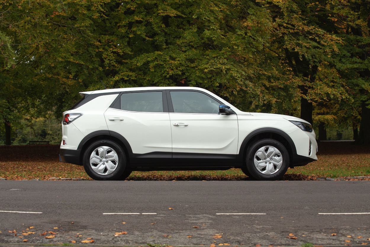 SsangYong Korando e-Motion side static, white car