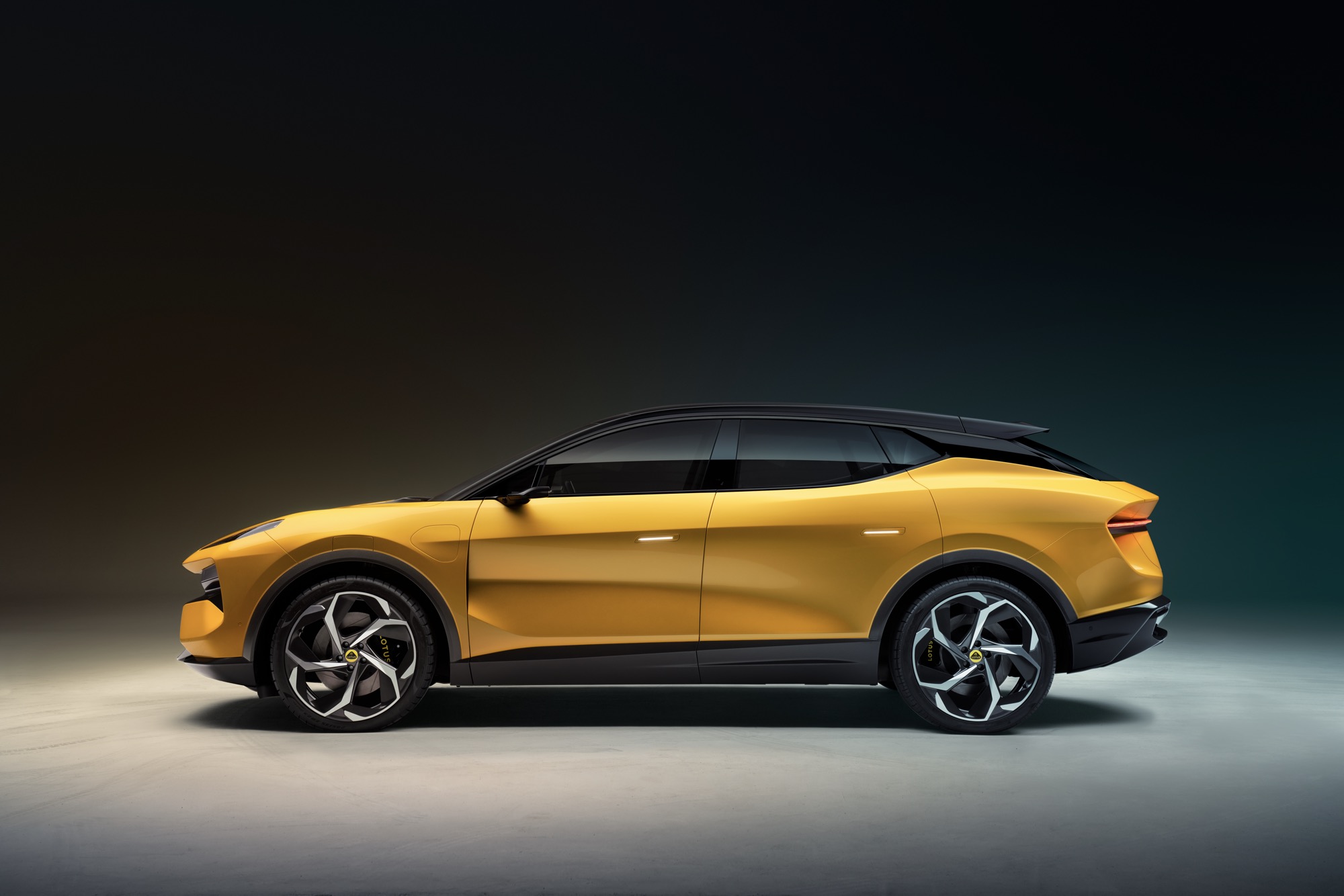 Lotus Eletre side on, studio, yellow car