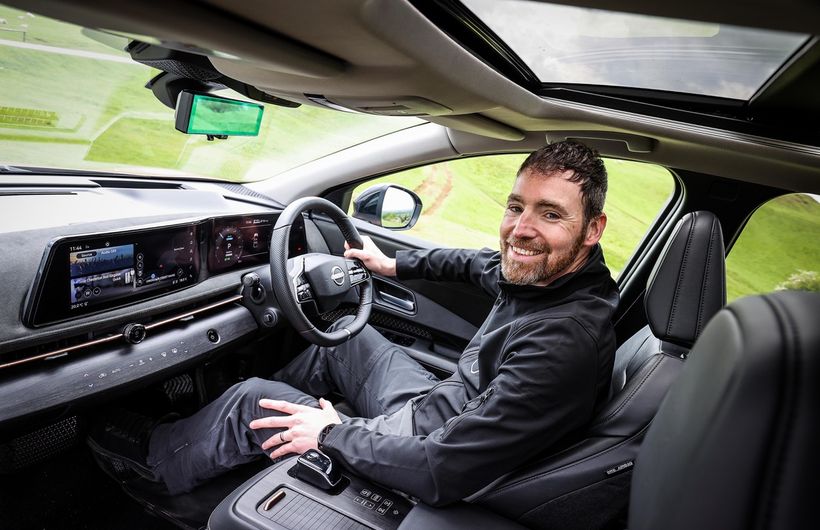 British adventurer Chris Ramsey in driver's seat of Nissan Ariya