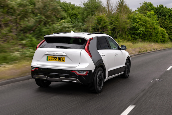Kia Niro ev, white, action shot, back three angles